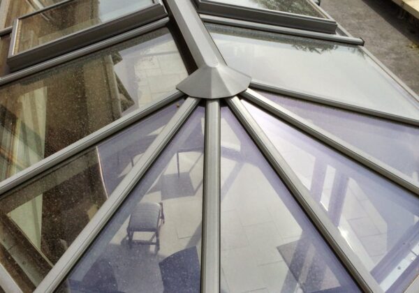 The lantern glass clean and the room lighter.
