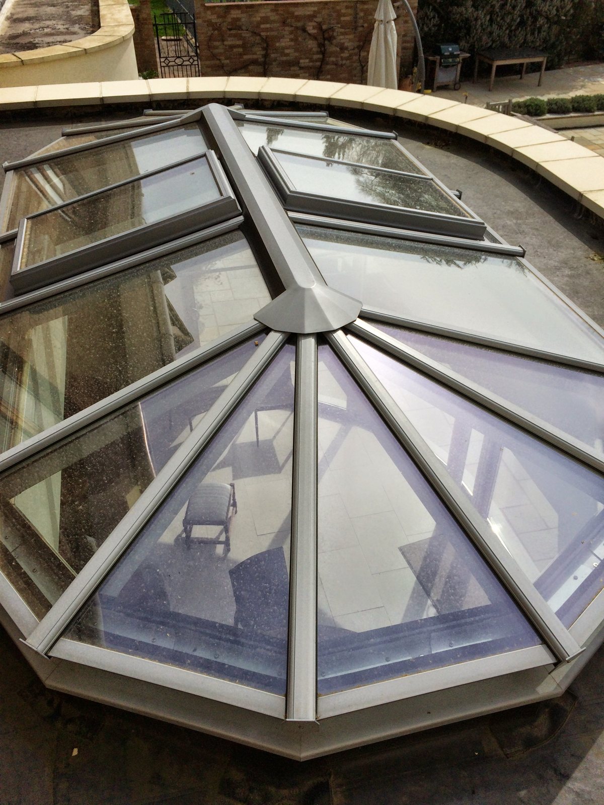 The lantern glass clean and the room lighter.