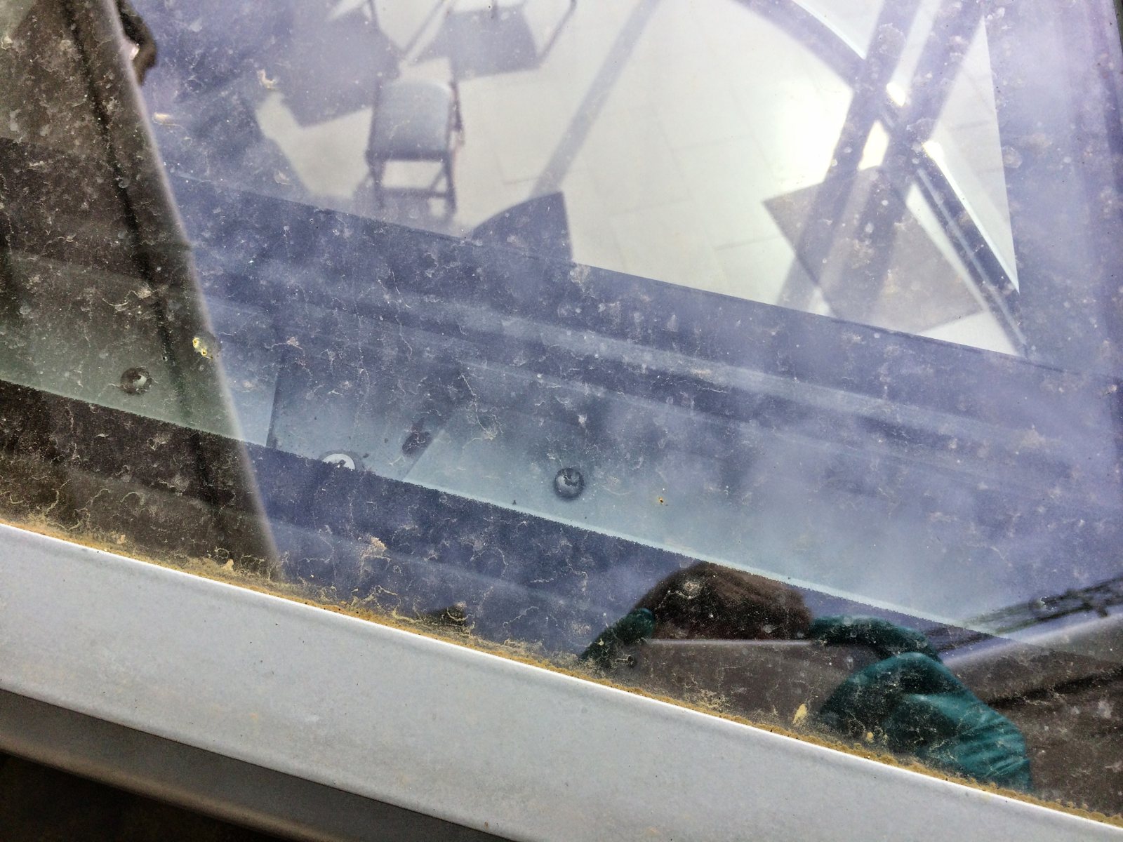 Dirt and water spots on the lantern glass.
