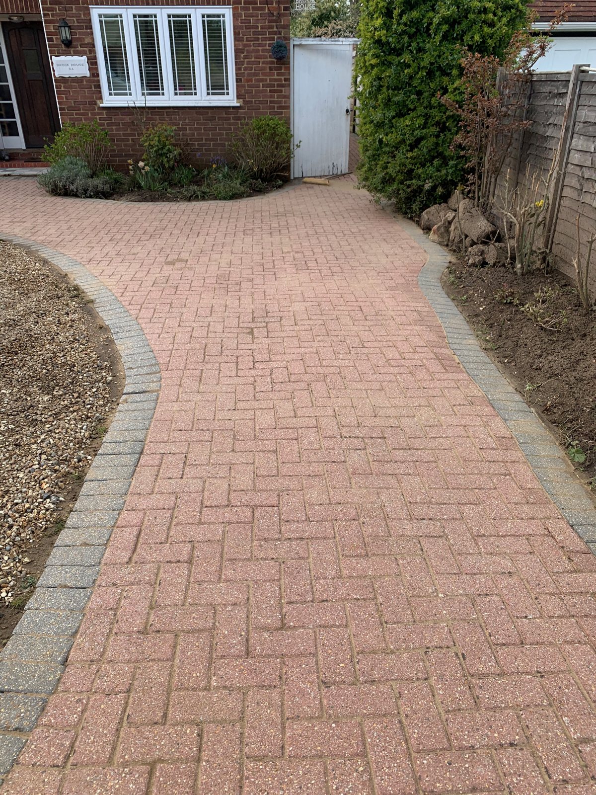 Clean block paving driveway after pressure washing in Woking, Surrey
