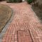 Freshly cleaned brick driveway path in Woking, Surrey