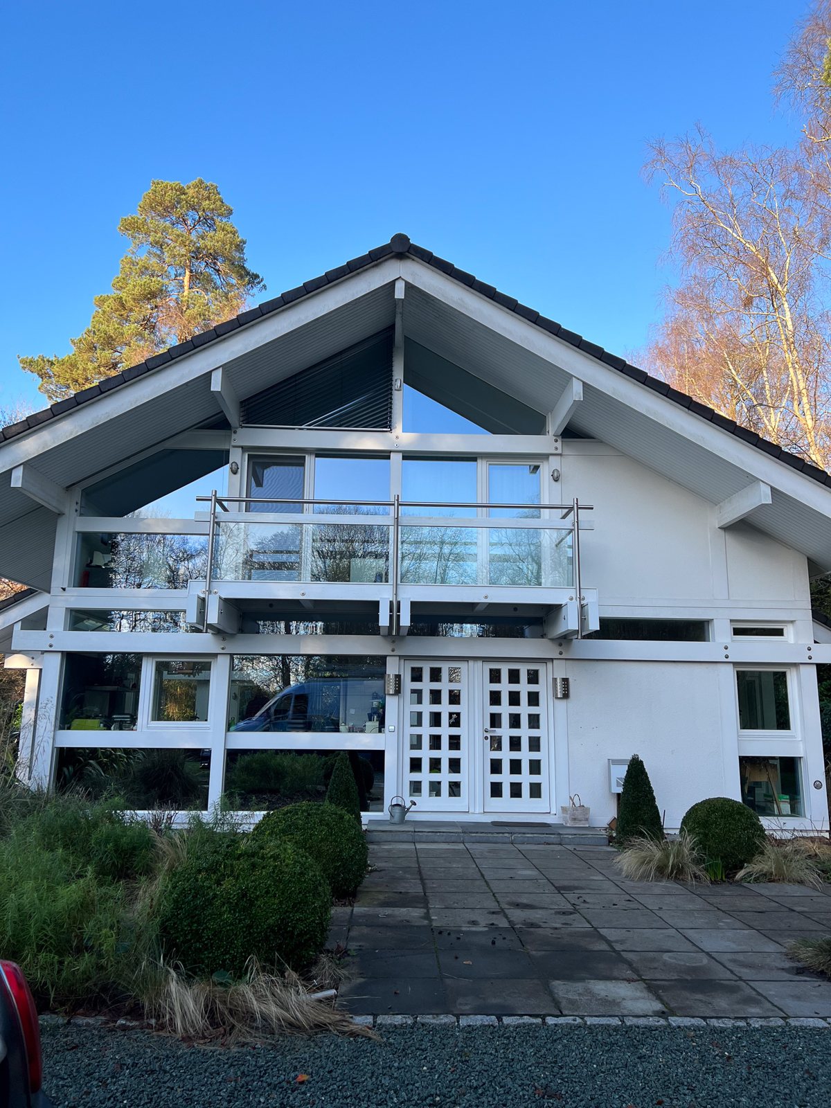 External woodwork cleaned in Godalming Surrey — white cladding restored