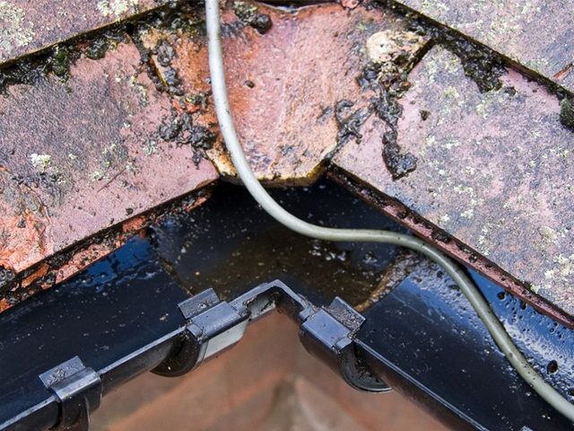 The gutter clear and draining.