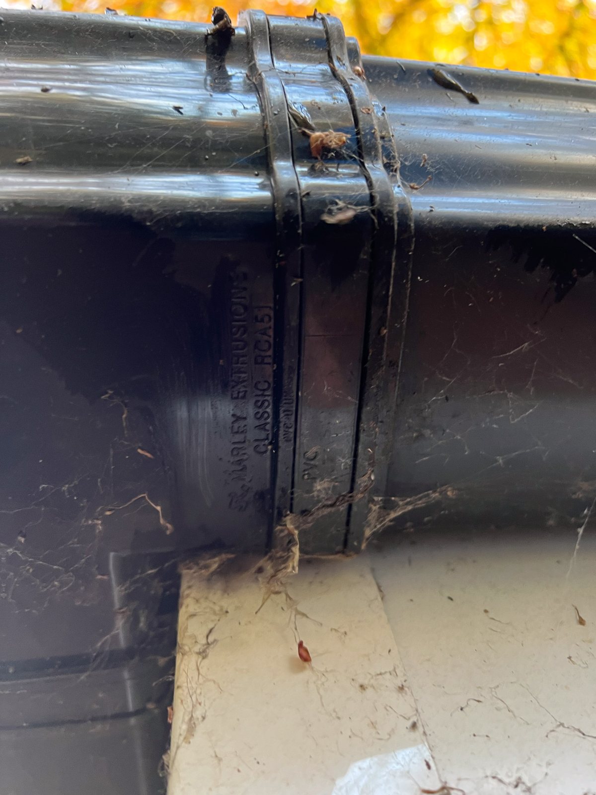 Repaired and sealed gutter joint in Surrey — watertight and clean