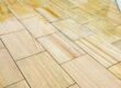 Restored sandstone patio slabs in Woking, Surrey