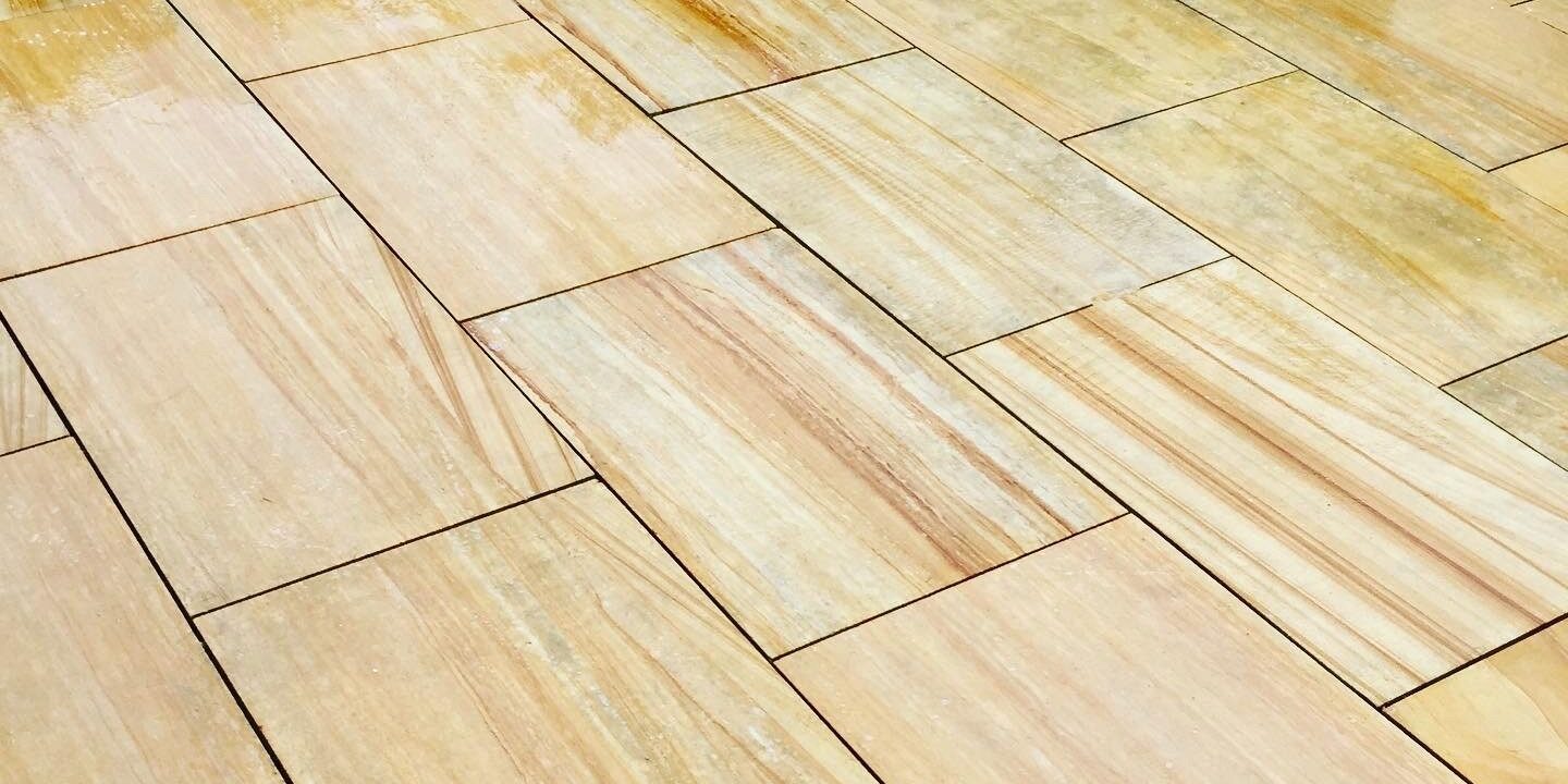 patio-cleaning-woking-surrey__featured Restored sandstone patio slabs in Woking, Surrey