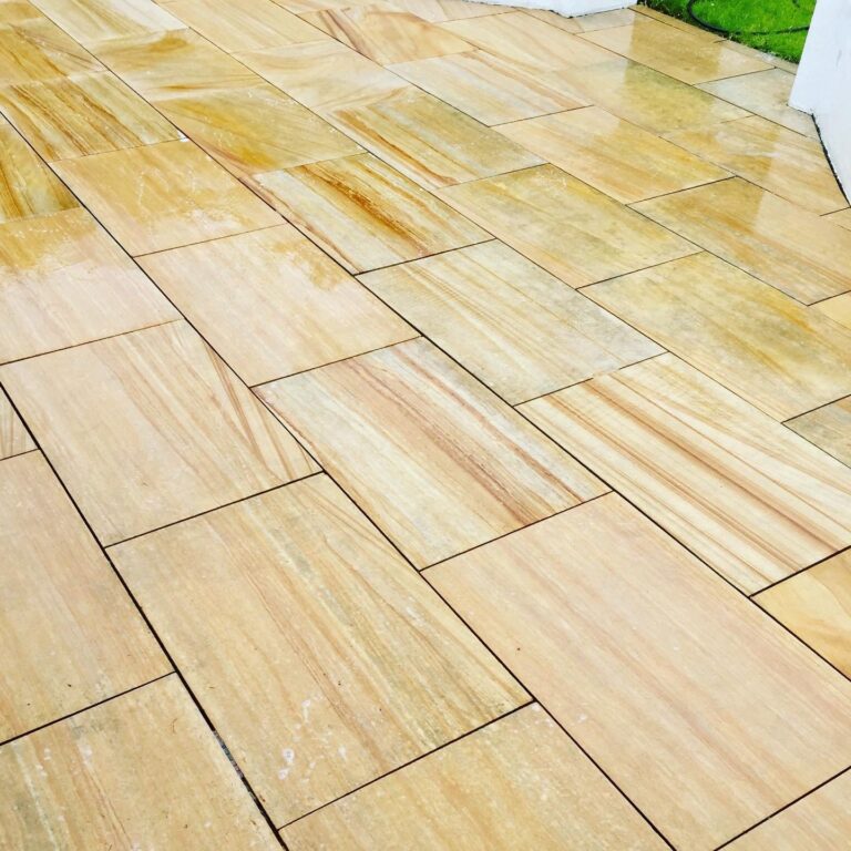Restored sandstone patio slabs in Woking, Surrey