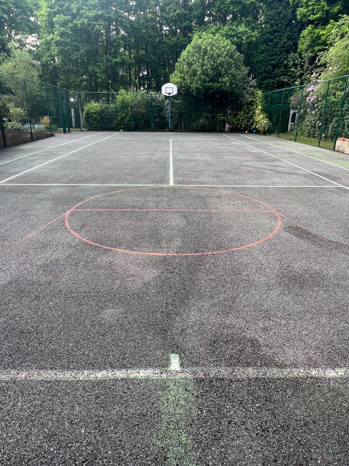 Tennis court cleaned in Crawley Down West Sussex — tarmac surface restored and lines clear