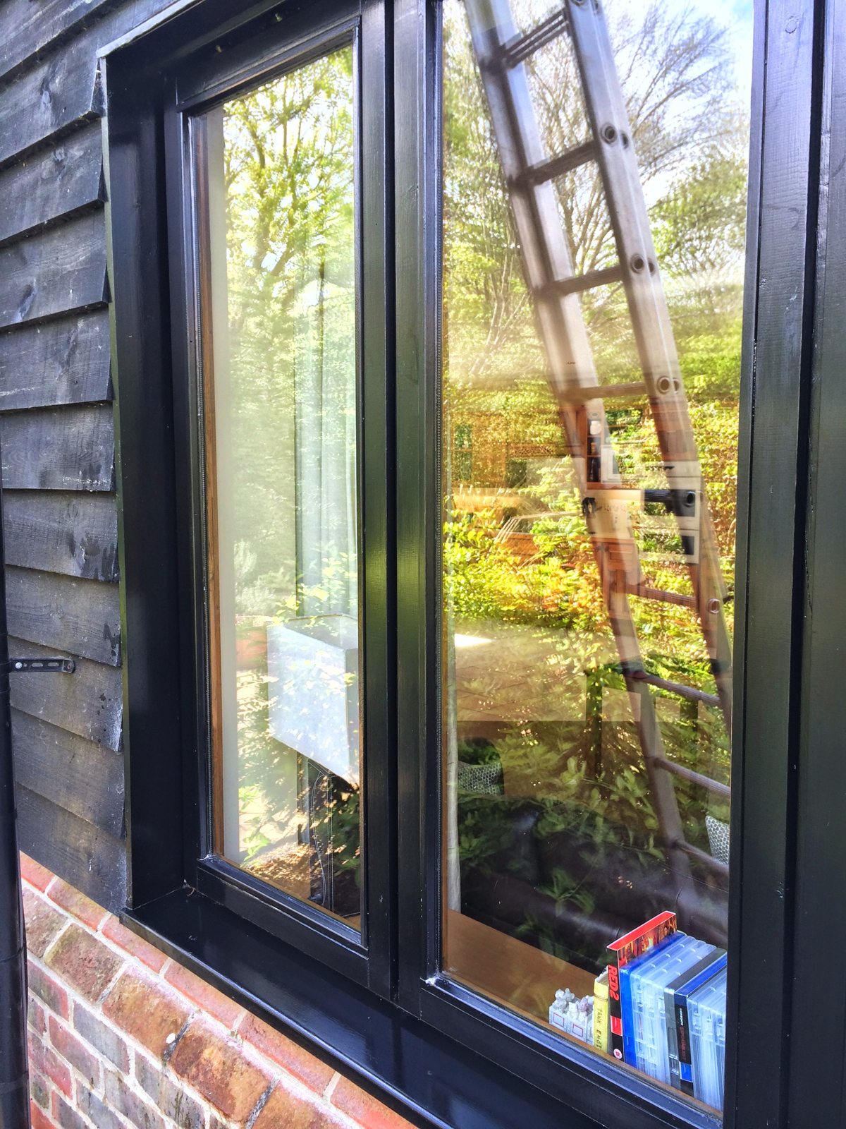 After: clean, spotless frames and glass.