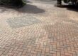 The block paving washed and re-sanded.