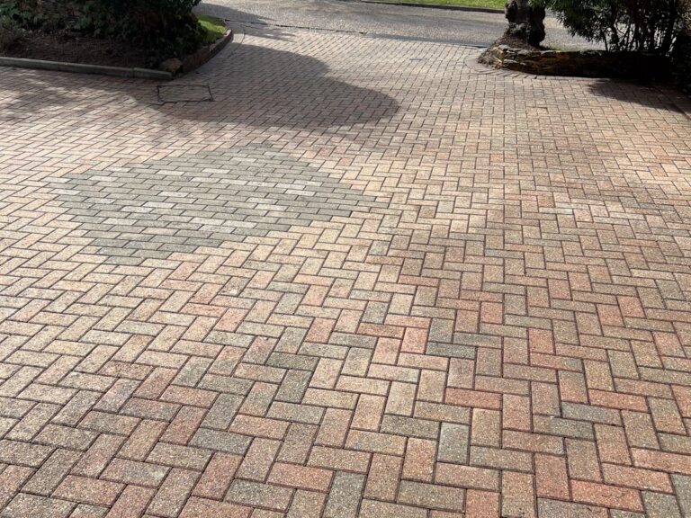 The block paving washed and re-sanded.