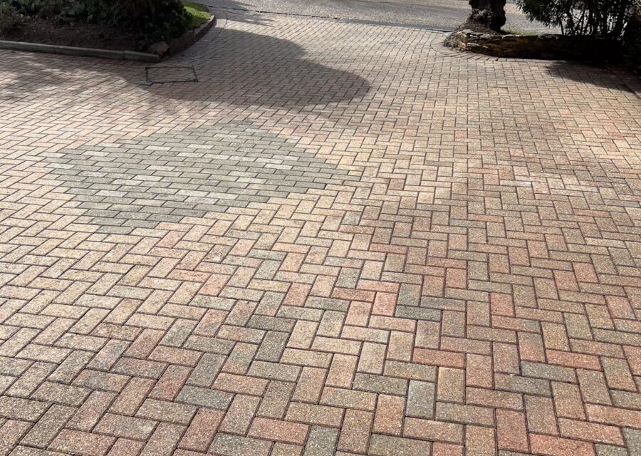 The block paving washed and re-sanded.