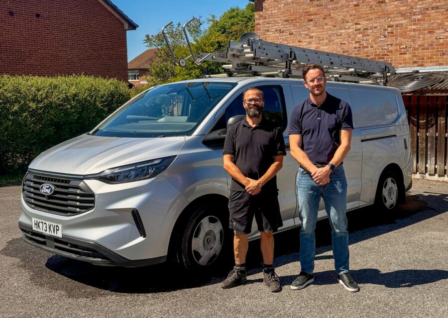 The Integrity Window Cleaning team with the van