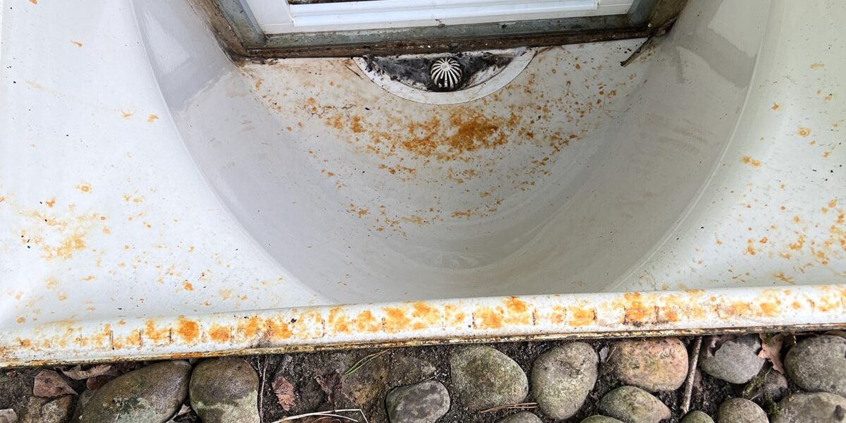 The lightwell cleared and washed down.