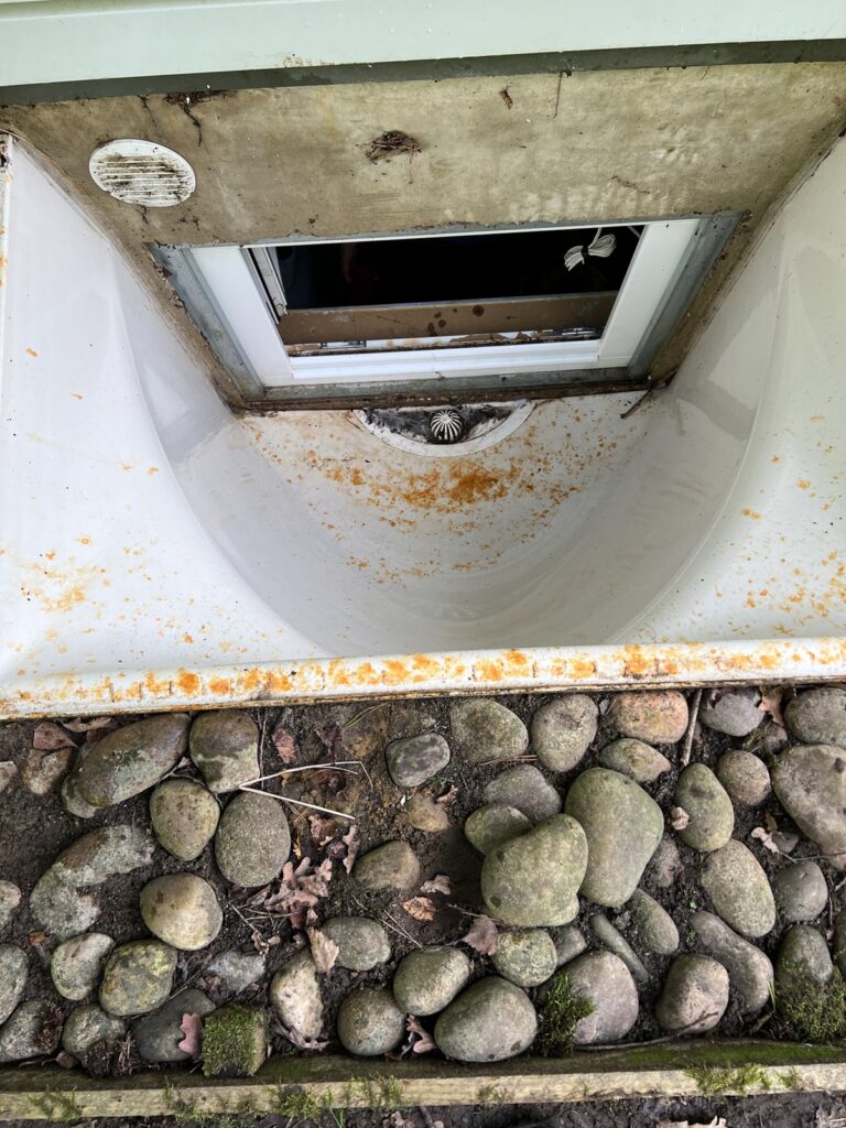 The lightwell cleared and washed down.