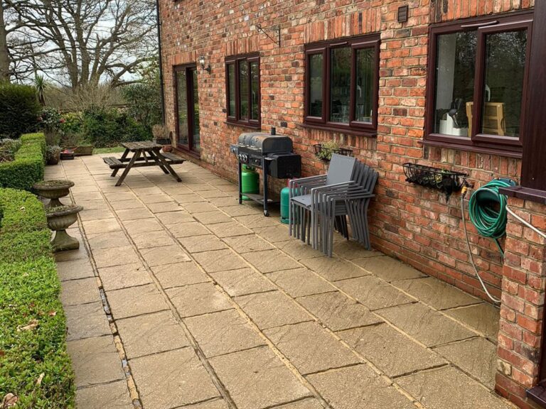 The paths and patio cleaned.