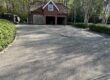 The tarmac driveway cleaned.