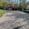 The tarmac driveway cleaned.