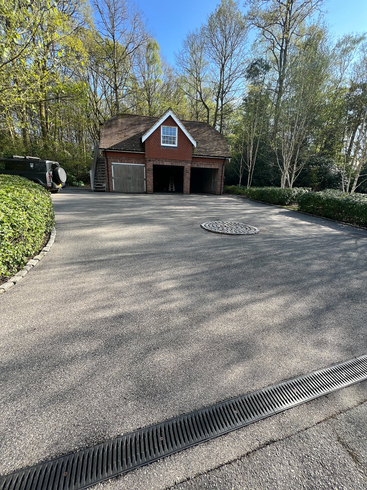 The tarmac driveway cleaned.